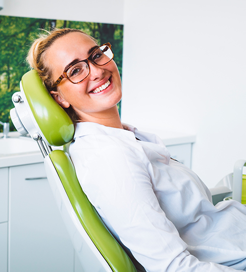 young woman in exam chair