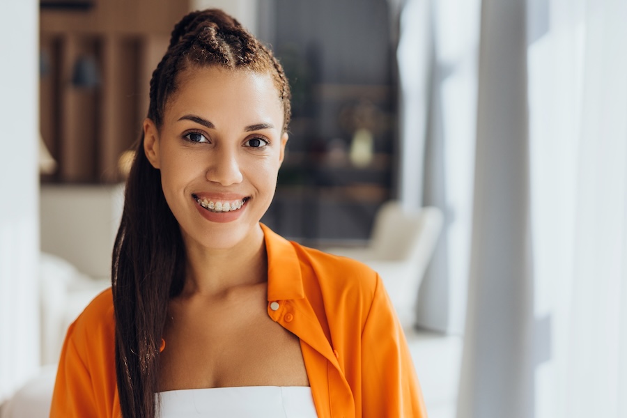 woman with braces, start orthodontic journey