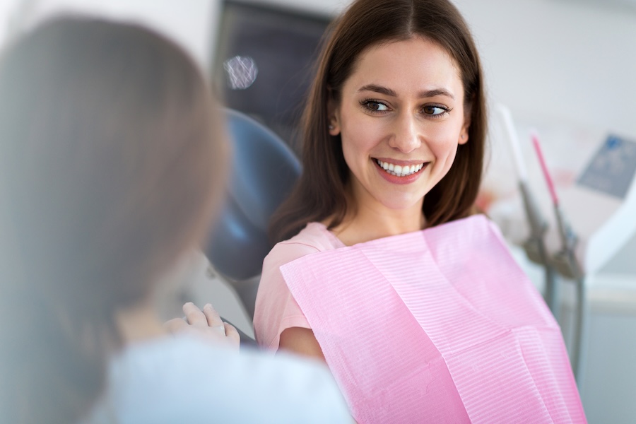 woman considering what to look for in an orthodontist while at a orthodontist consultation