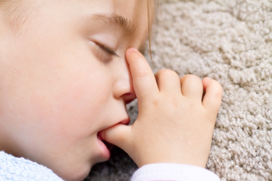 young child thumb sucking which can increase need for orthodontic treatment