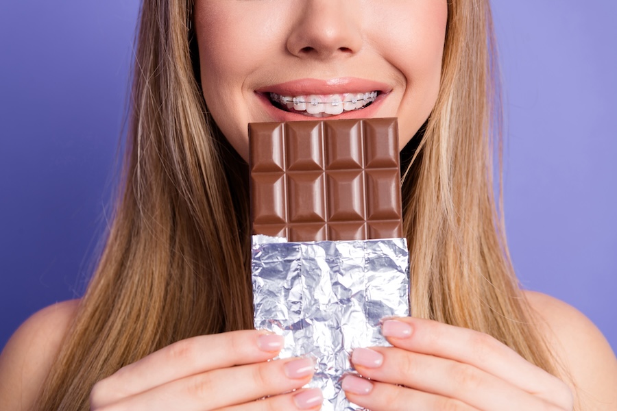 girl in braces at Halloween in chocolate